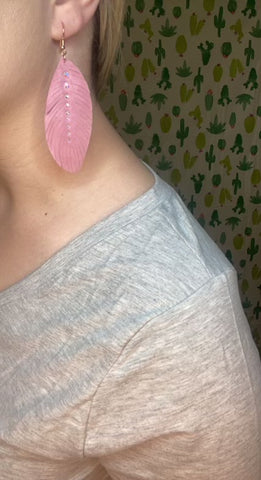 Pink suede feather earrings